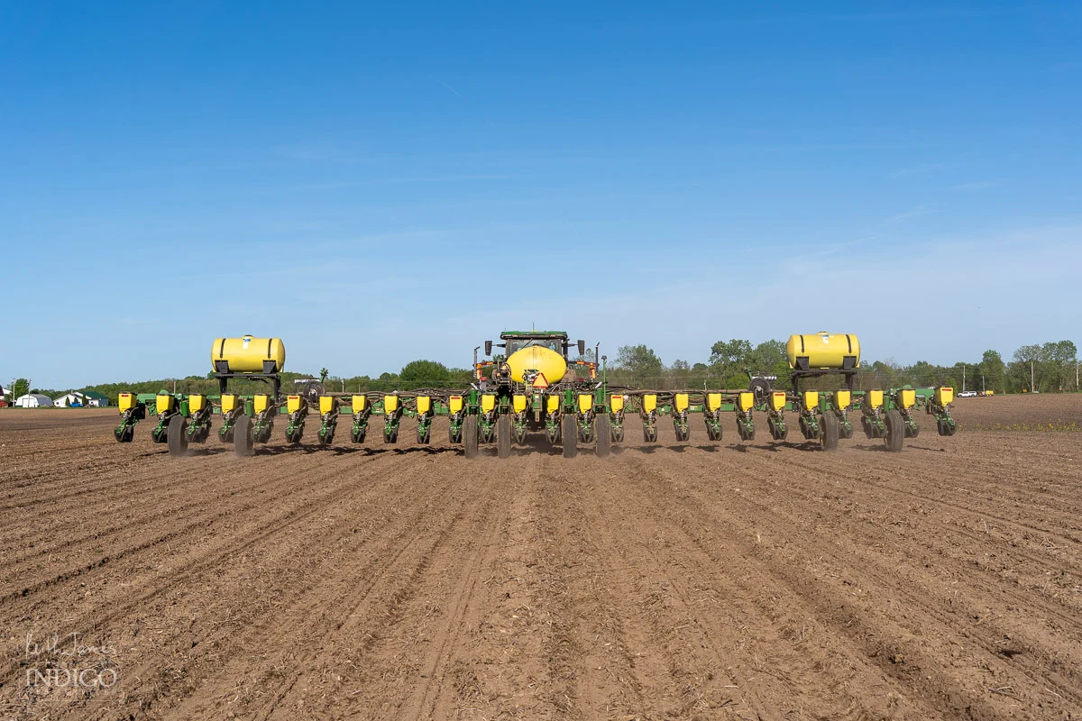 A farmer spraying a field in northeast Indiana.