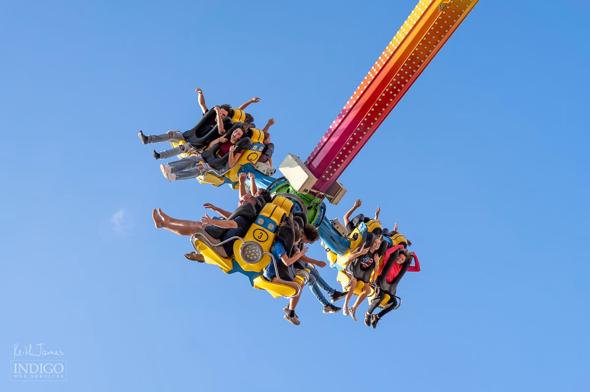 A carnival ride filled with people at Corn School in LaGrange, Indiana.