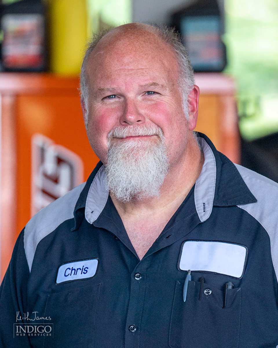 Portrait of a manager for a tire repair shop.