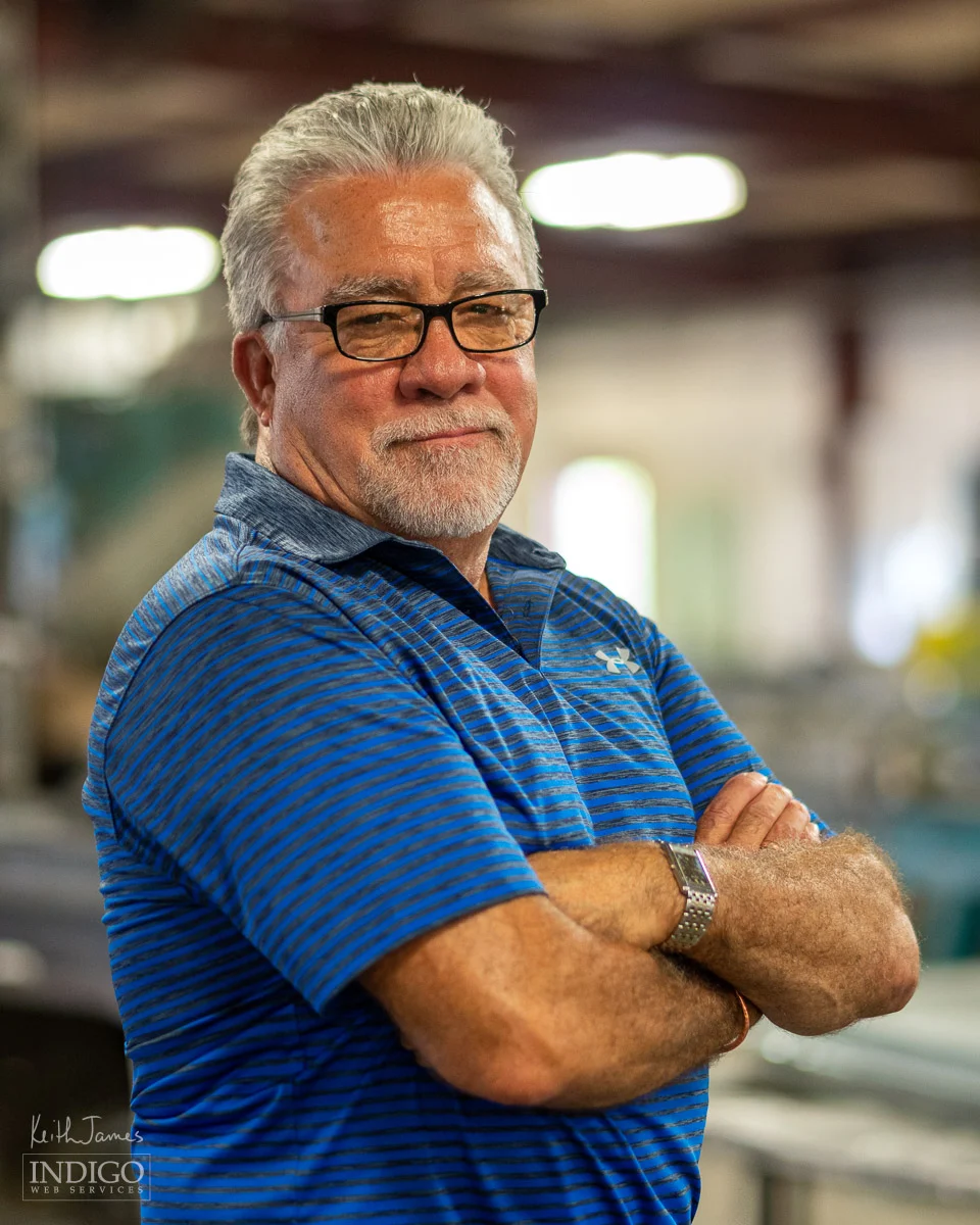 Portrait of the owner of a manufacturing business.